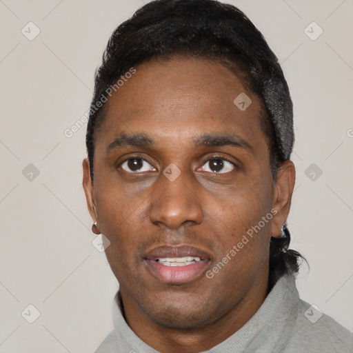 Neutral black young-adult male with short  black hair and brown eyes