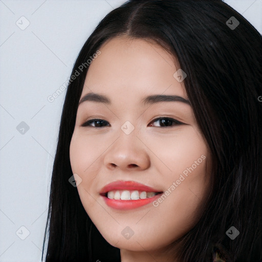 Joyful white young-adult female with long  black hair and brown eyes