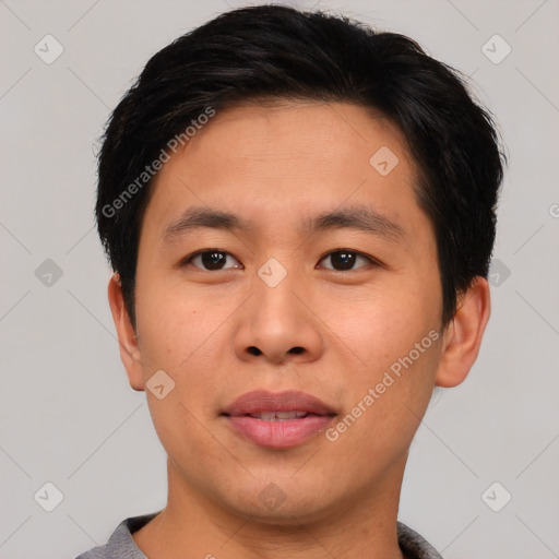 Joyful asian young-adult male with short  brown hair and brown eyes