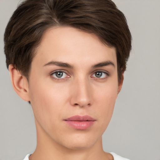 Neutral white young-adult female with short  brown hair and brown eyes