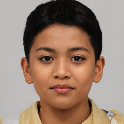 Joyful asian child female with short  black hair and brown eyes