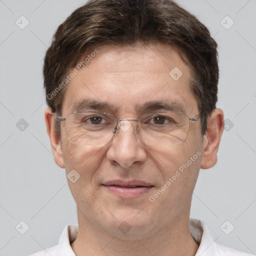 Joyful white adult male with short  brown hair and brown eyes