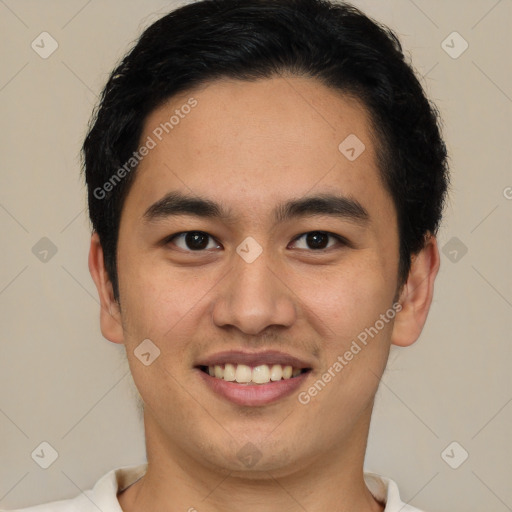 Joyful latino young-adult male with short  brown hair and brown eyes