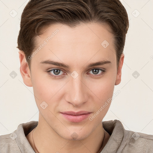 Joyful white young-adult female with short  brown hair and grey eyes