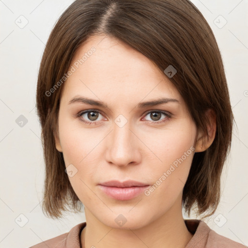 Neutral white young-adult female with medium  brown hair and brown eyes