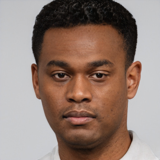 Neutral black young-adult male with short  black hair and brown eyes