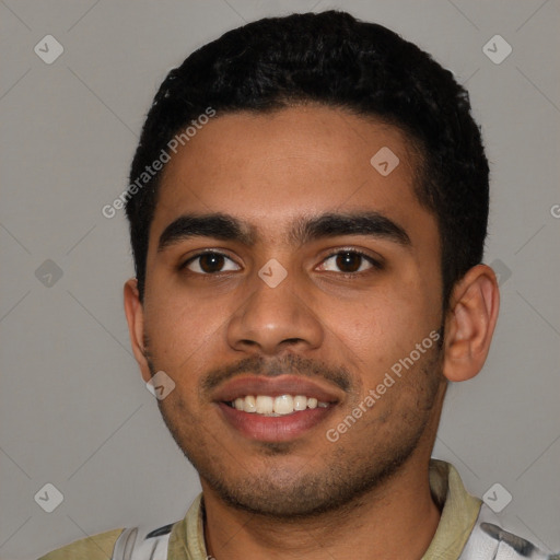 Joyful latino young-adult male with short  black hair and brown eyes