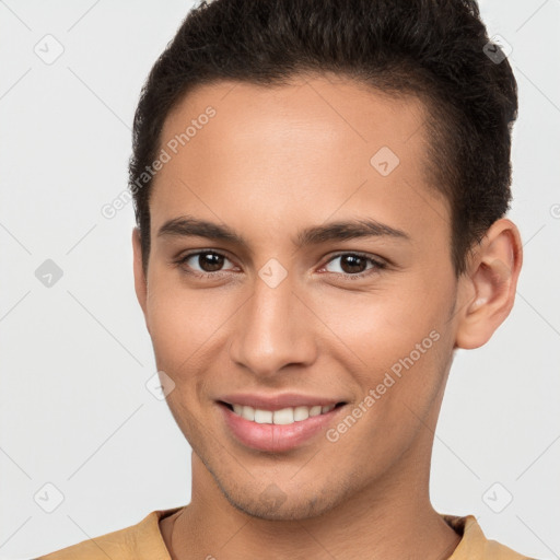 Joyful white young-adult male with short  brown hair and brown eyes