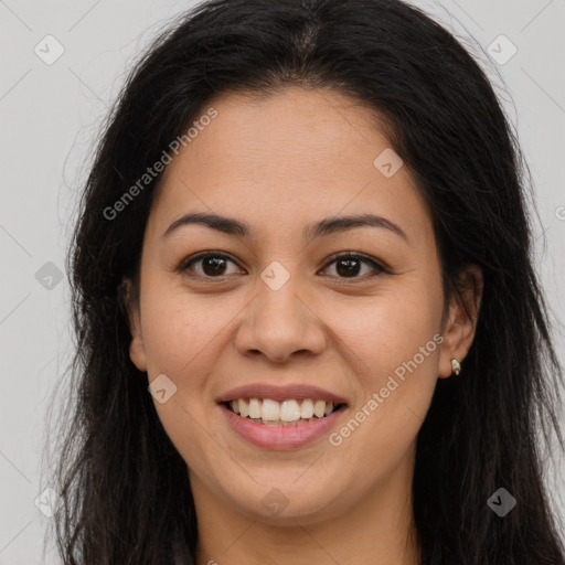 Joyful latino young-adult female with long  brown hair and brown eyes