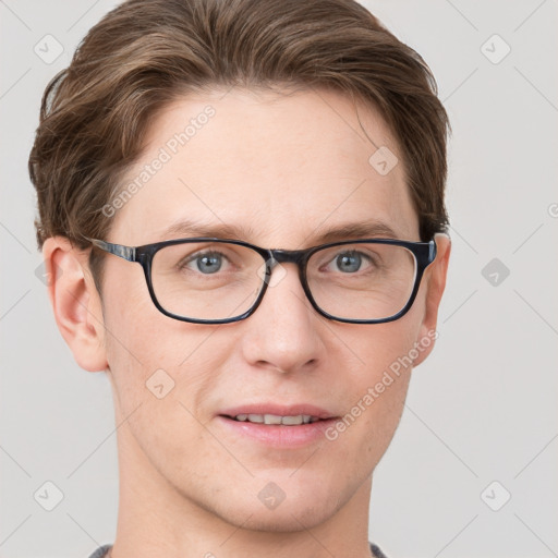 Joyful white adult male with short  brown hair and grey eyes