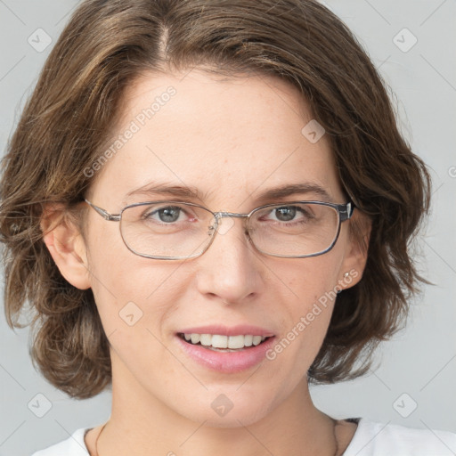 Joyful white adult female with medium  brown hair and blue eyes