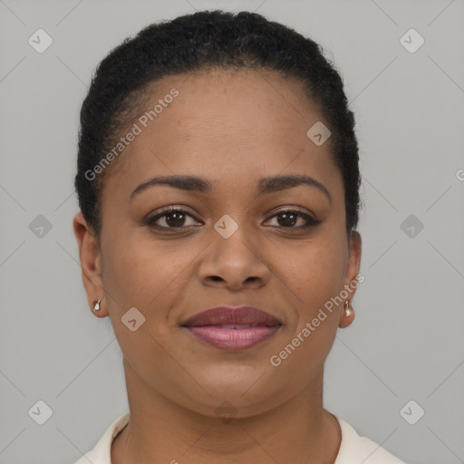 Joyful black young-adult female with short  brown hair and brown eyes