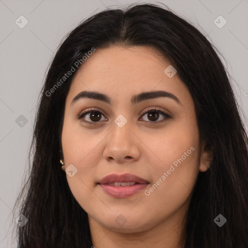 Joyful latino young-adult female with long  brown hair and brown eyes