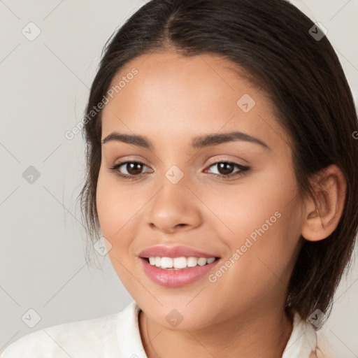 Joyful white young-adult female with medium  brown hair and brown eyes