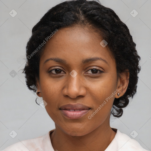 Joyful black young-adult female with medium  black hair and brown eyes