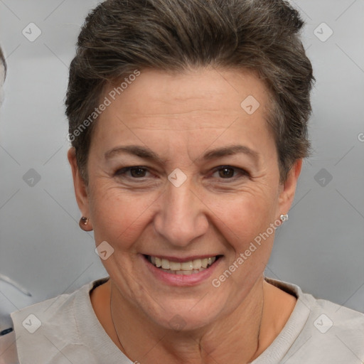 Joyful white adult female with short  brown hair and brown eyes