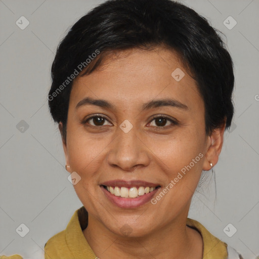 Joyful asian young-adult female with short  brown hair and brown eyes