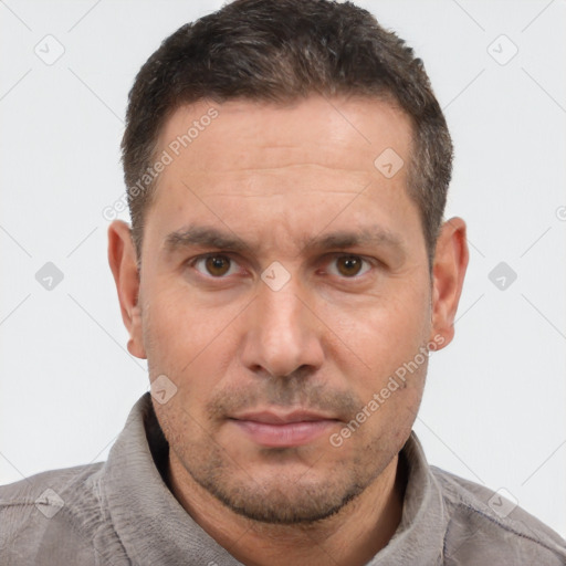 Neutral white adult male with short  brown hair and brown eyes