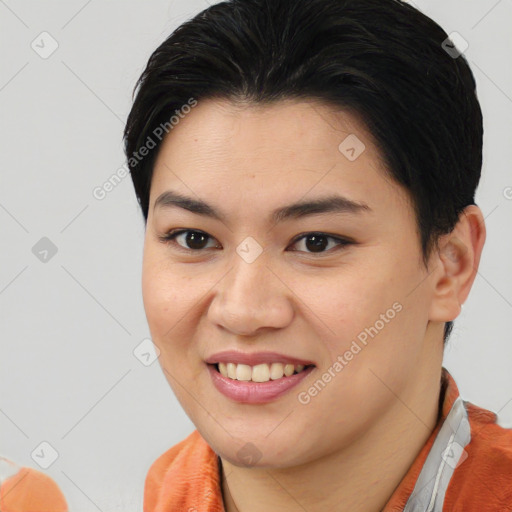 Joyful asian young-adult female with medium  brown hair and brown eyes
