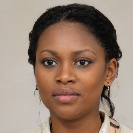 Neutral black young-adult female with medium  black hair and brown eyes