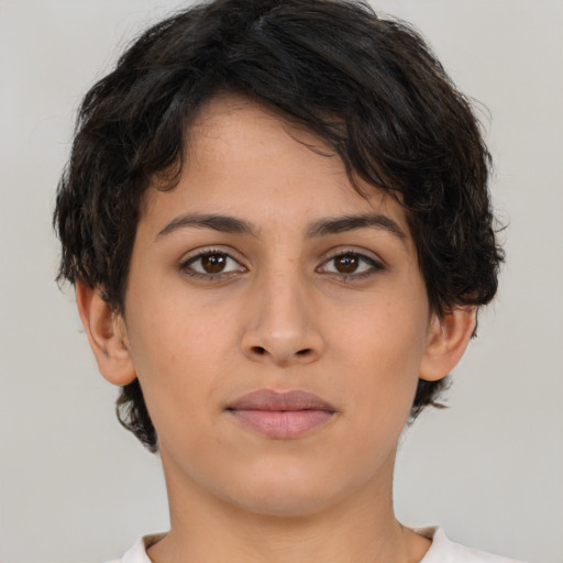 Neutral white young-adult female with short  brown hair and brown eyes