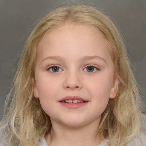 Joyful white child female with medium  brown hair and grey eyes