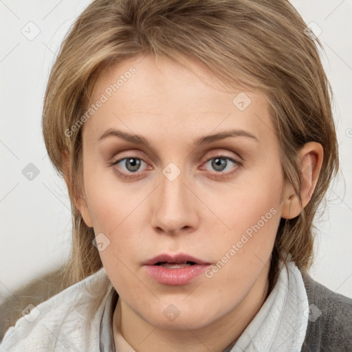 Neutral white young-adult female with medium  brown hair and grey eyes