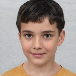 Joyful white child male with short  brown hair and brown eyes