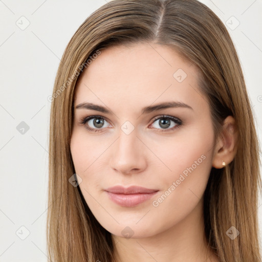 Neutral white young-adult female with long  brown hair and brown eyes