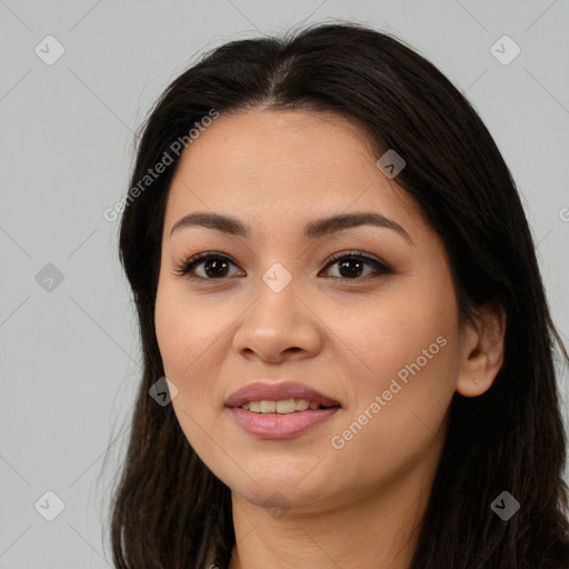 Joyful asian young-adult female with long  brown hair and brown eyes