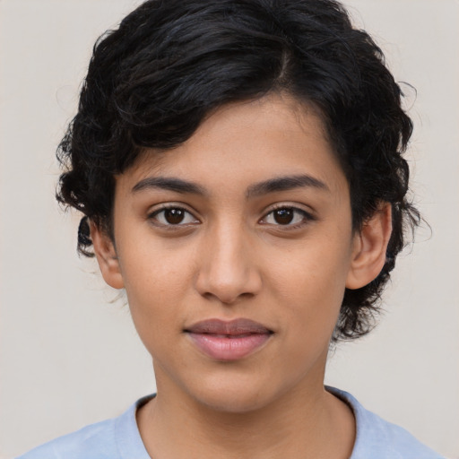 Joyful latino young-adult female with medium  black hair and brown eyes