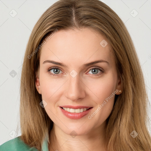 Joyful white young-adult female with long  brown hair and grey eyes