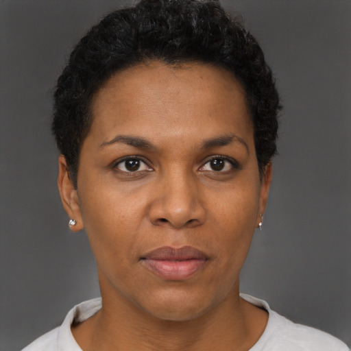 Neutral black adult female with short  black hair and brown eyes