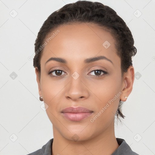 Neutral latino young-adult female with short  black hair and brown eyes