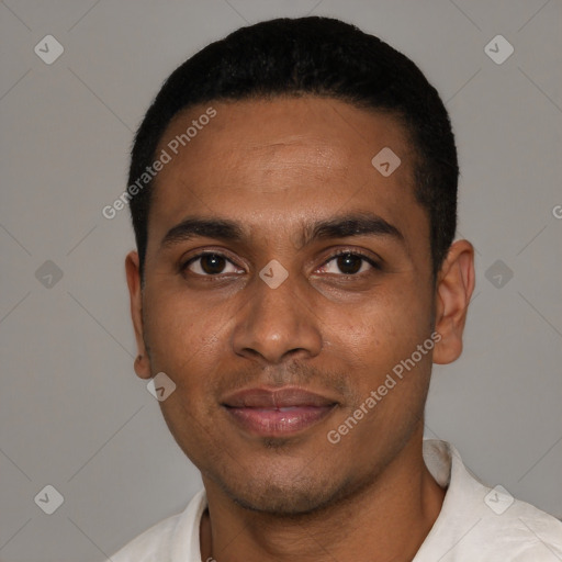Joyful black young-adult male with short  black hair and brown eyes