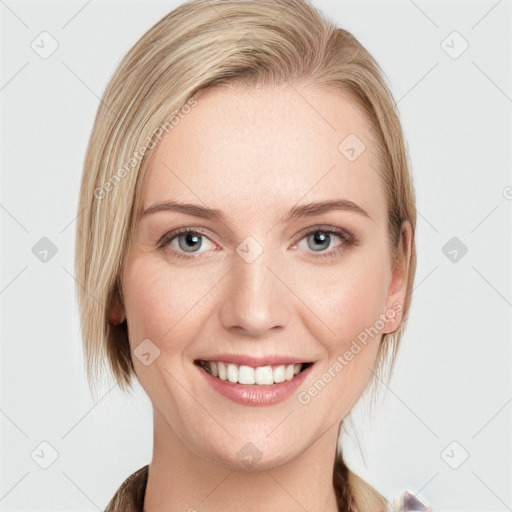 Joyful white young-adult female with medium  brown hair and blue eyes