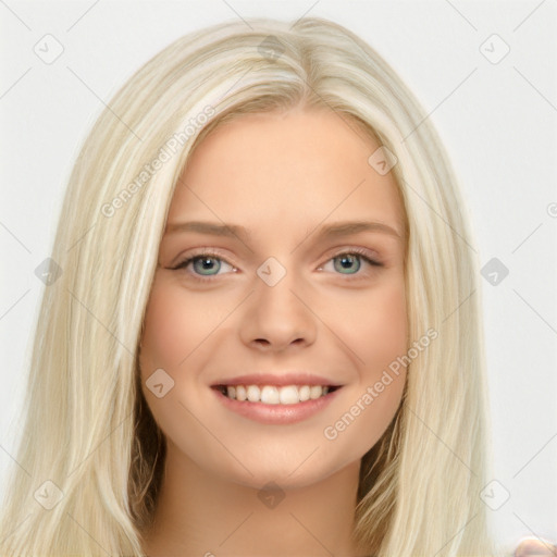 Joyful white young-adult female with long  brown hair and blue eyes