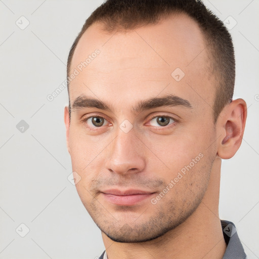 Neutral white young-adult male with short  brown hair and brown eyes