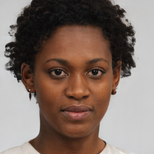 Neutral black young-adult female with short  brown hair and brown eyes
