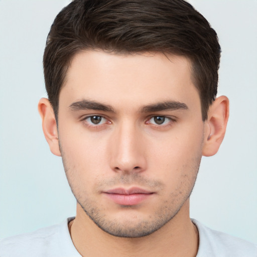 Neutral white young-adult male with short  brown hair and brown eyes