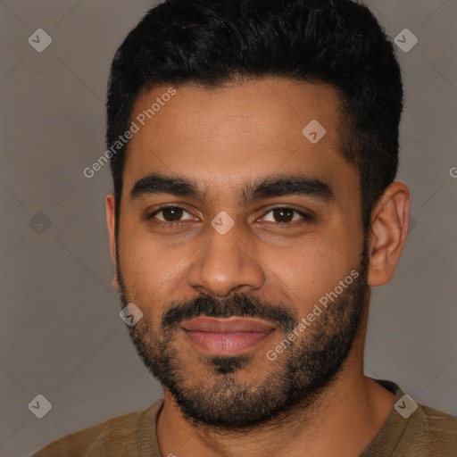 Joyful latino young-adult male with short  black hair and brown eyes