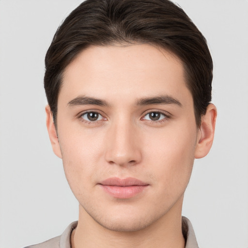 Neutral white young-adult male with short  brown hair and brown eyes