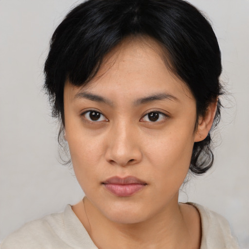 Neutral asian young-adult female with medium  black hair and brown eyes