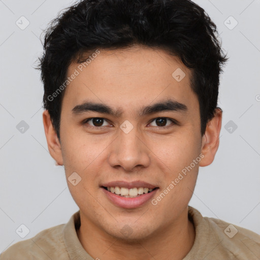 Joyful latino young-adult male with short  brown hair and brown eyes