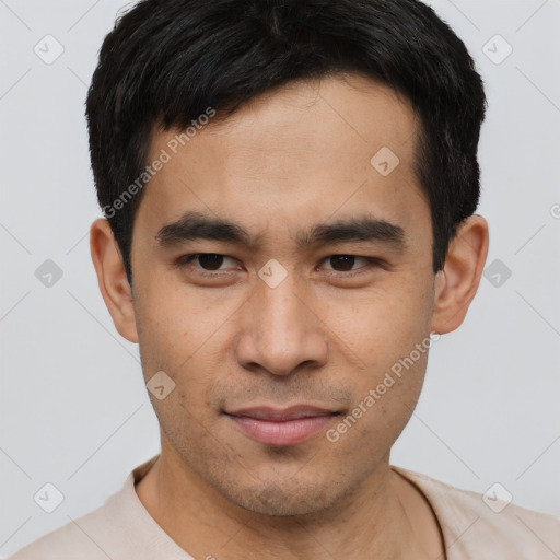 Joyful latino young-adult male with short  brown hair and brown eyes