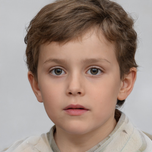 Neutral white child male with short  brown hair and grey eyes