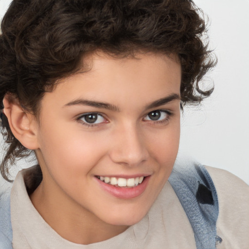 Joyful white child female with medium  brown hair and brown eyes