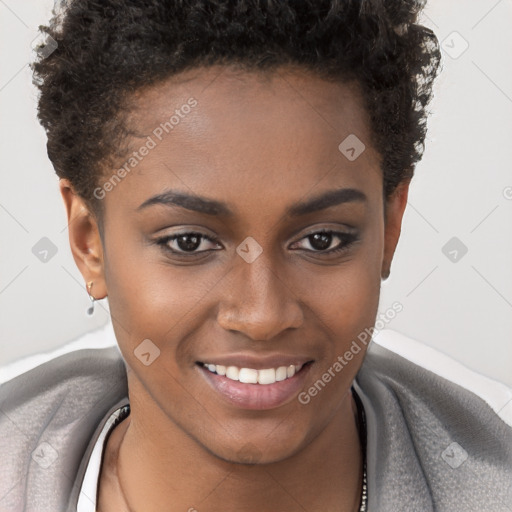 Joyful black young-adult female with short  brown hair and brown eyes