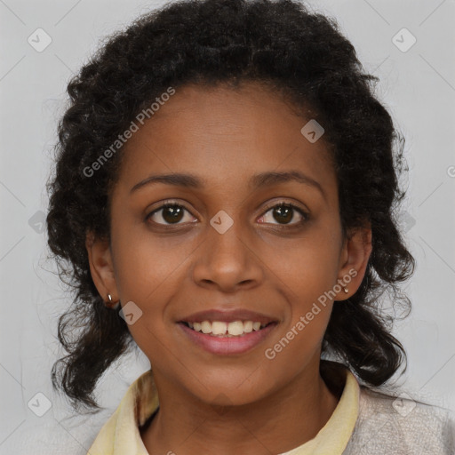 Joyful black young-adult female with long  brown hair and brown eyes