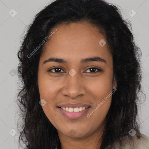 Joyful latino young-adult female with long  brown hair and brown eyes